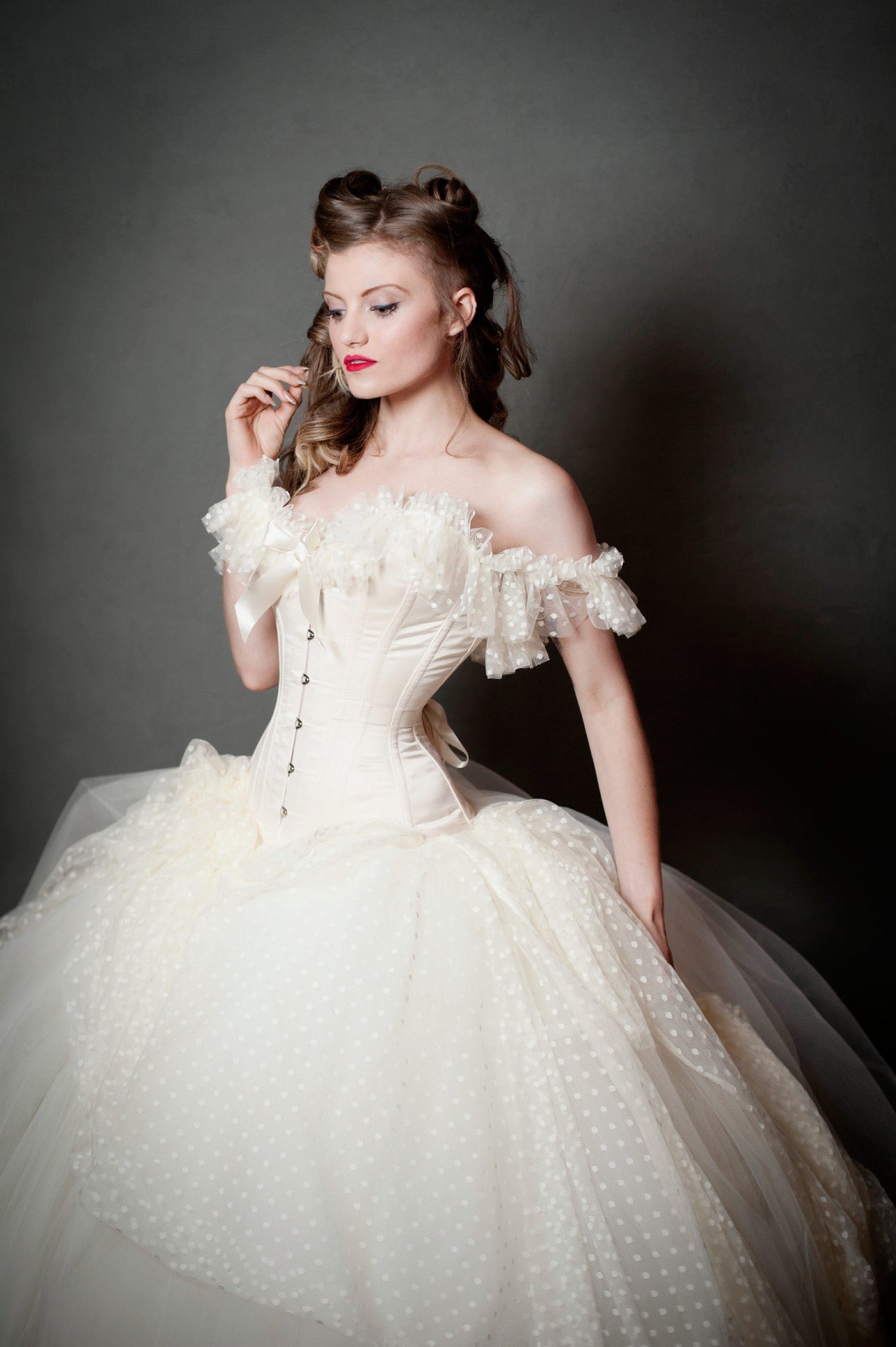 Cream overbust corset with soft polka dot tulle shoulder and neckline